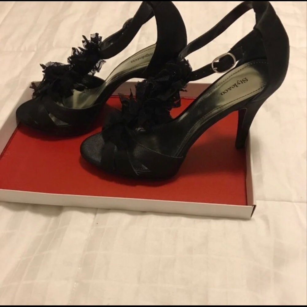 Black ruffle heels